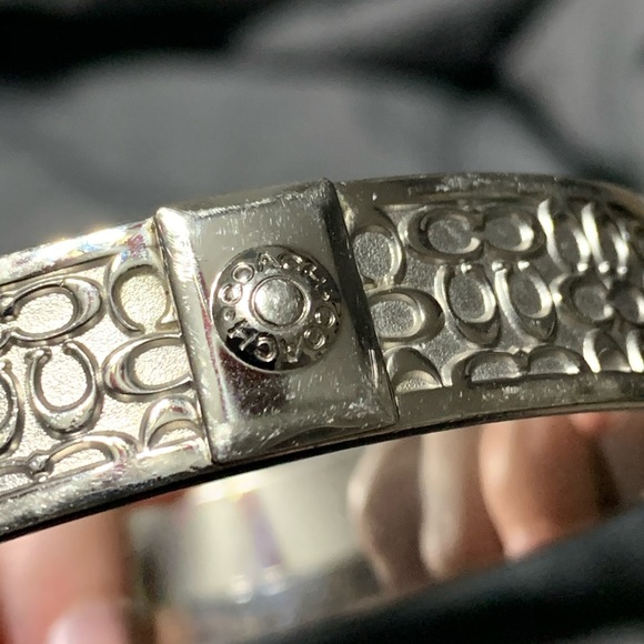 Coach signature silver tone bangle bracelet